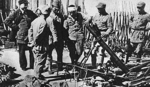 Defeated Japanese hand over weapons and equipment to the Chinese Army