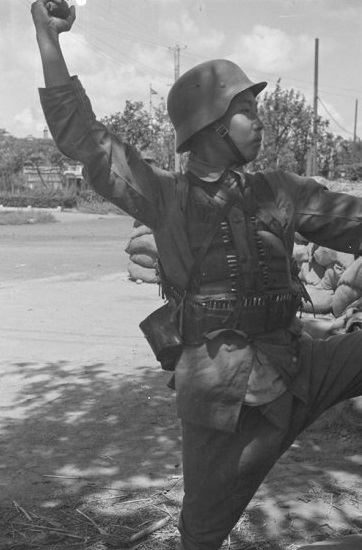 Nationalist soldier, with hand grenade